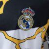 2025-26 REAL MADRID MARVEL T-SHIRT WHITE/GOLD