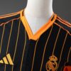 2025-26 REAL MADRID BLACK AND ORANGE US PACK FAN VERSION