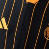 2025-26 REAL MADRID BLACK AND ORANGE US PACK FAN VERSION