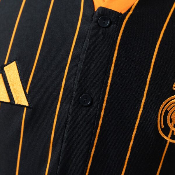 2025-26 REAL MADRID BLACK AND ORANGE US PACK FAN VERSION
