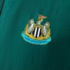 NEWCASTLE UNITED REVERSIBLE JACKET WINDBREAKER - ARMY GREEN & YELLOW