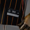 2025-26 REAL MADRID BLACK AND ORANGE US PACK FAN VERSION